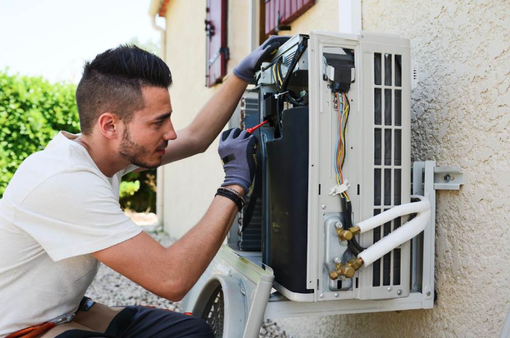 Guy working on HVAC