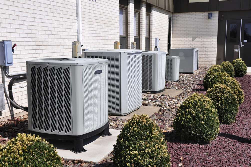 image of air conditioning units outside of apartments